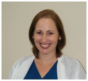 Yuliet, a dental assitant smiling